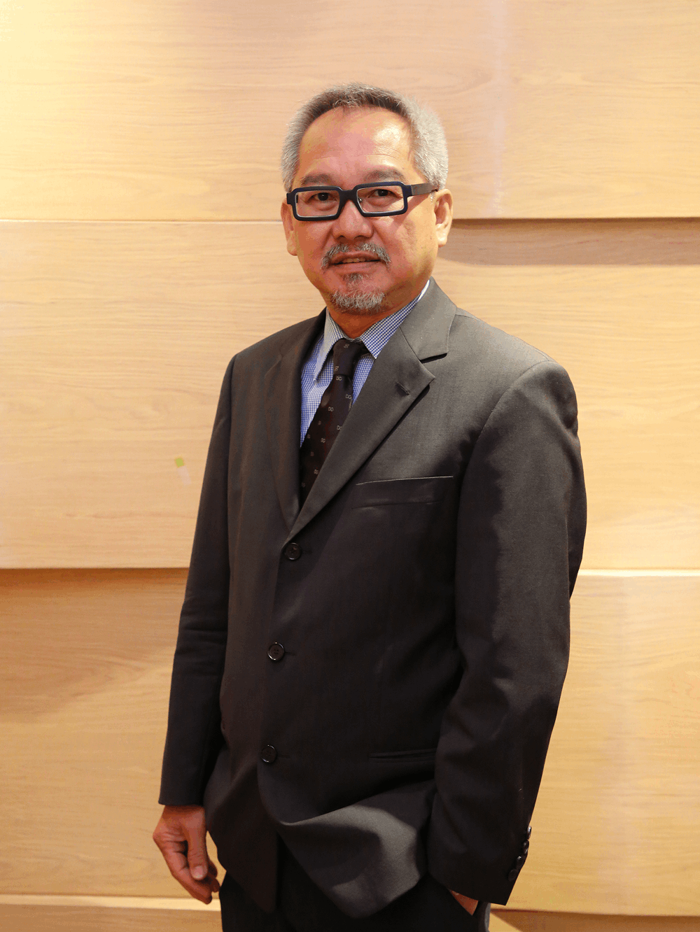 Portrait of Mr. WISIT KANJANOPAS, Executive Director, Head of Legal.