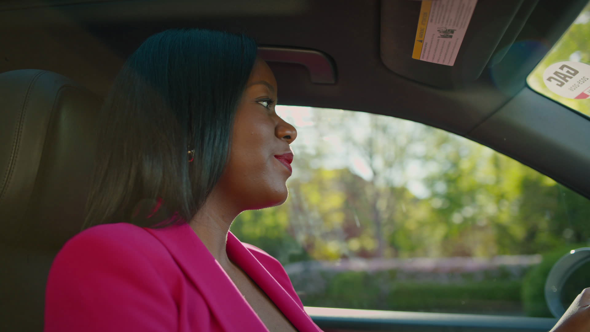 Canva x Keller Williams, still of woman driving