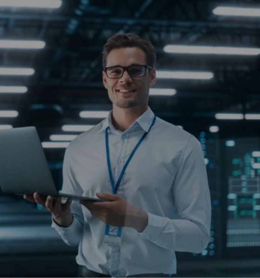 IT professional holding a computer
