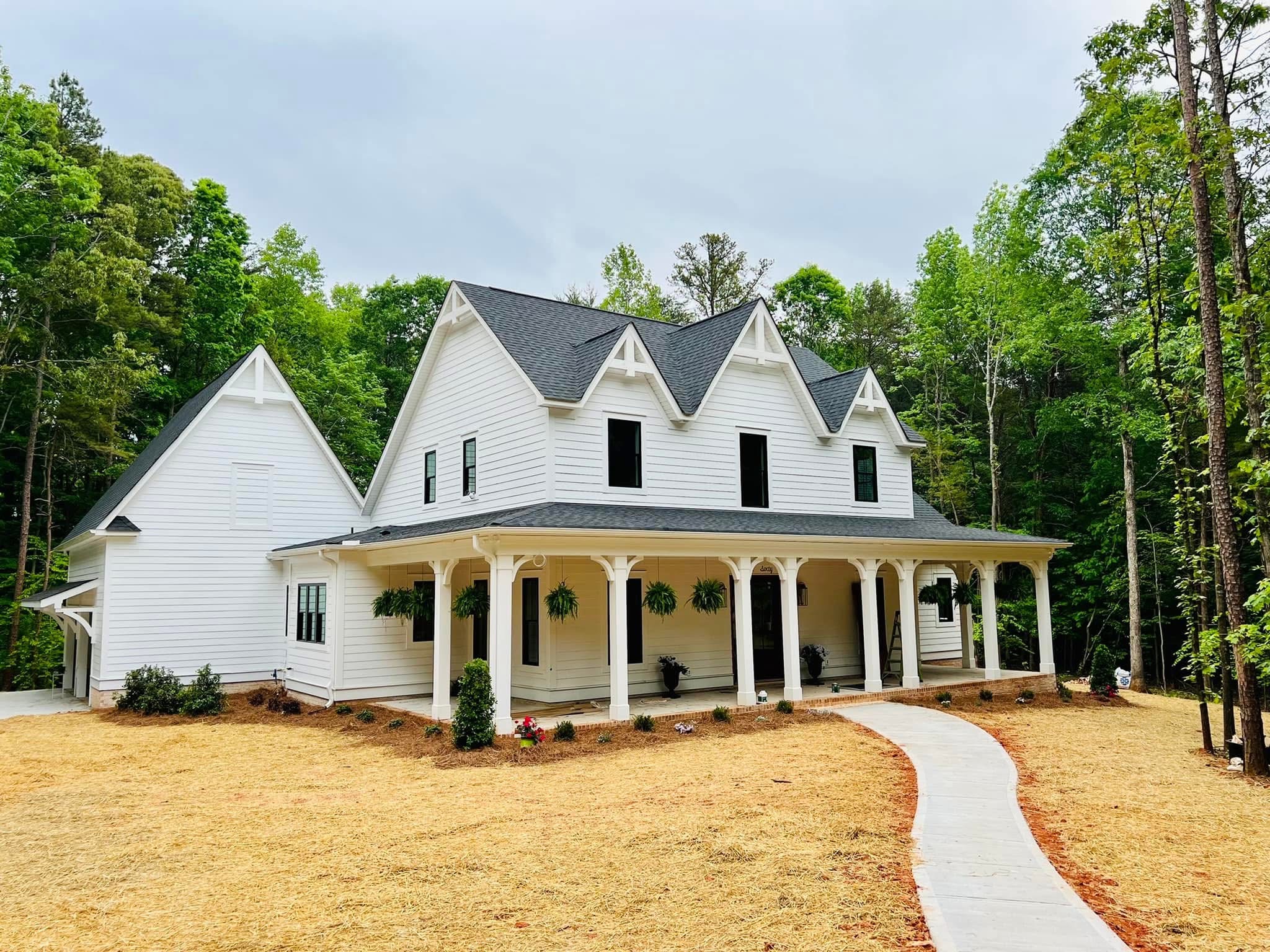 Exterior house painting project completed by Ivan Painting LLC in Charlotte, NC
