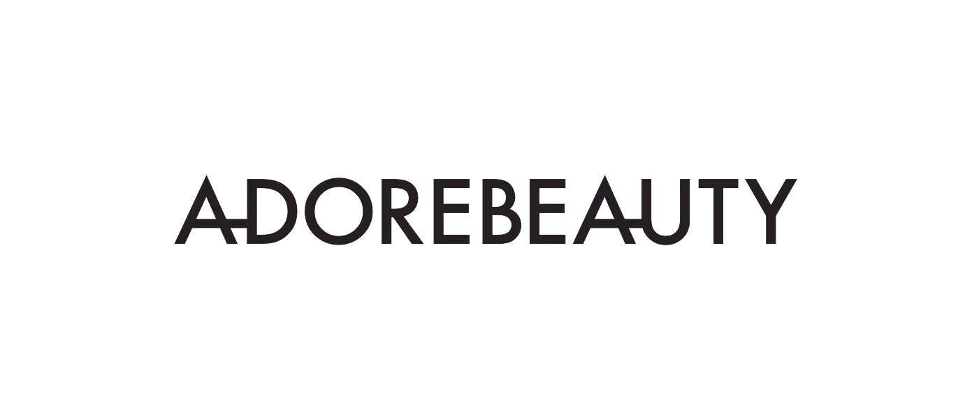AdoreBeauty brand name text logo on a black background.