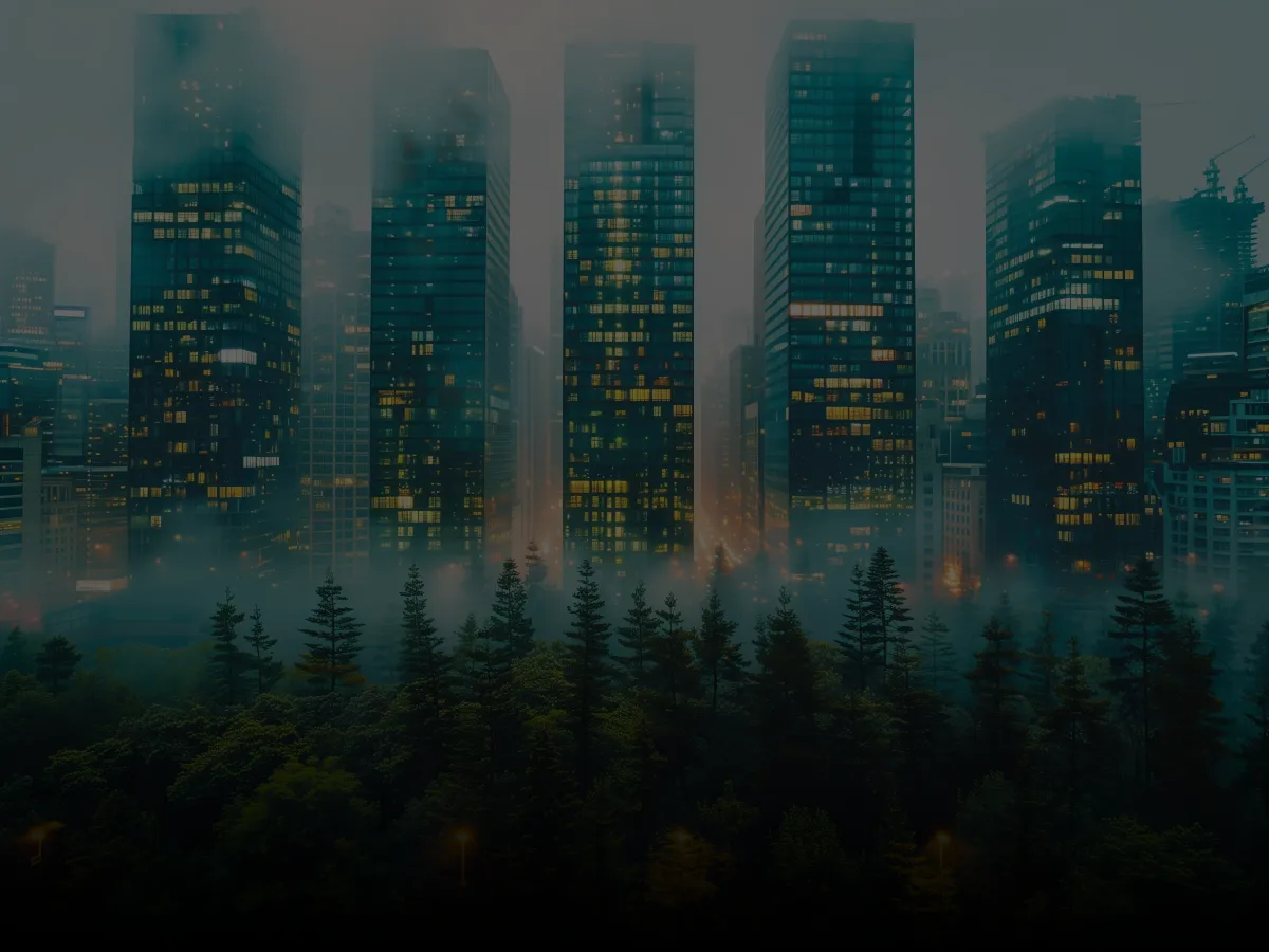 City skyline rising above a misty evergreen forest
