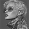 Portrait of a woman with silver hair and sunglasses in futuristic fashion.
