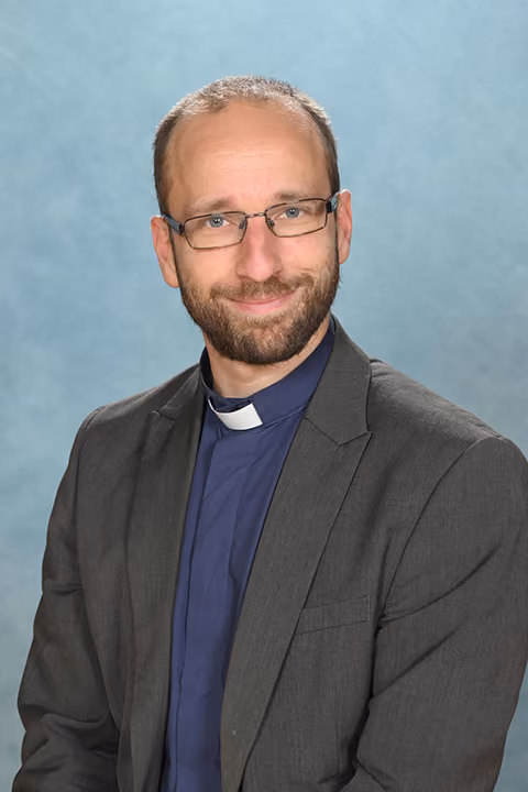 Headshot of Rev C Hunter, Governor.