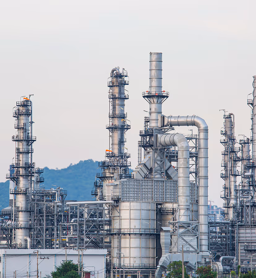 Oil and gas refinery at dusk