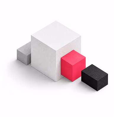 Four cubes of different sizes and colors arranged in a row casting shadows on a white surface; from left to right the cubes are small grey, large white, medium pink, and medium black.