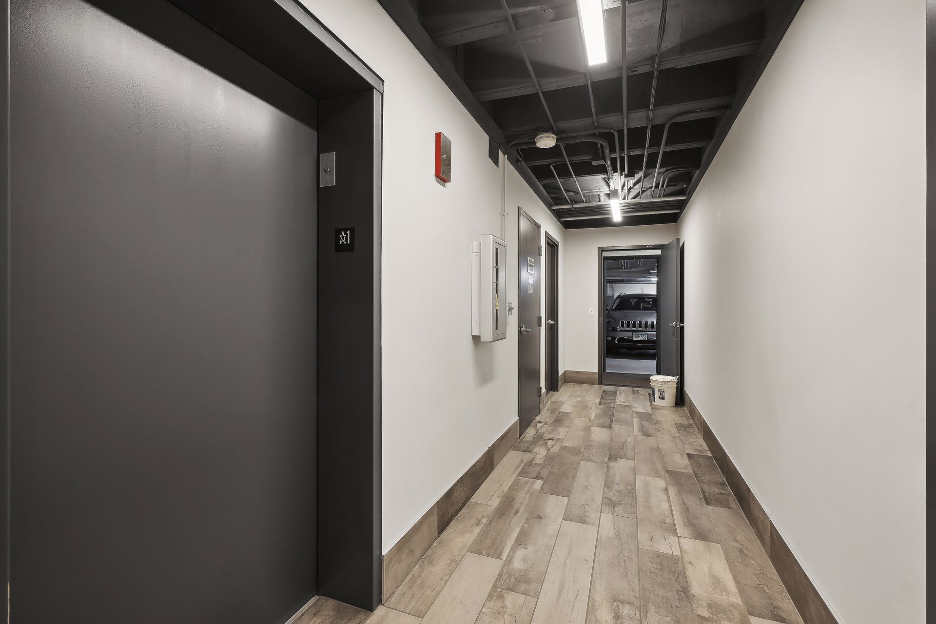 Elevator lobby with wood plank flooring