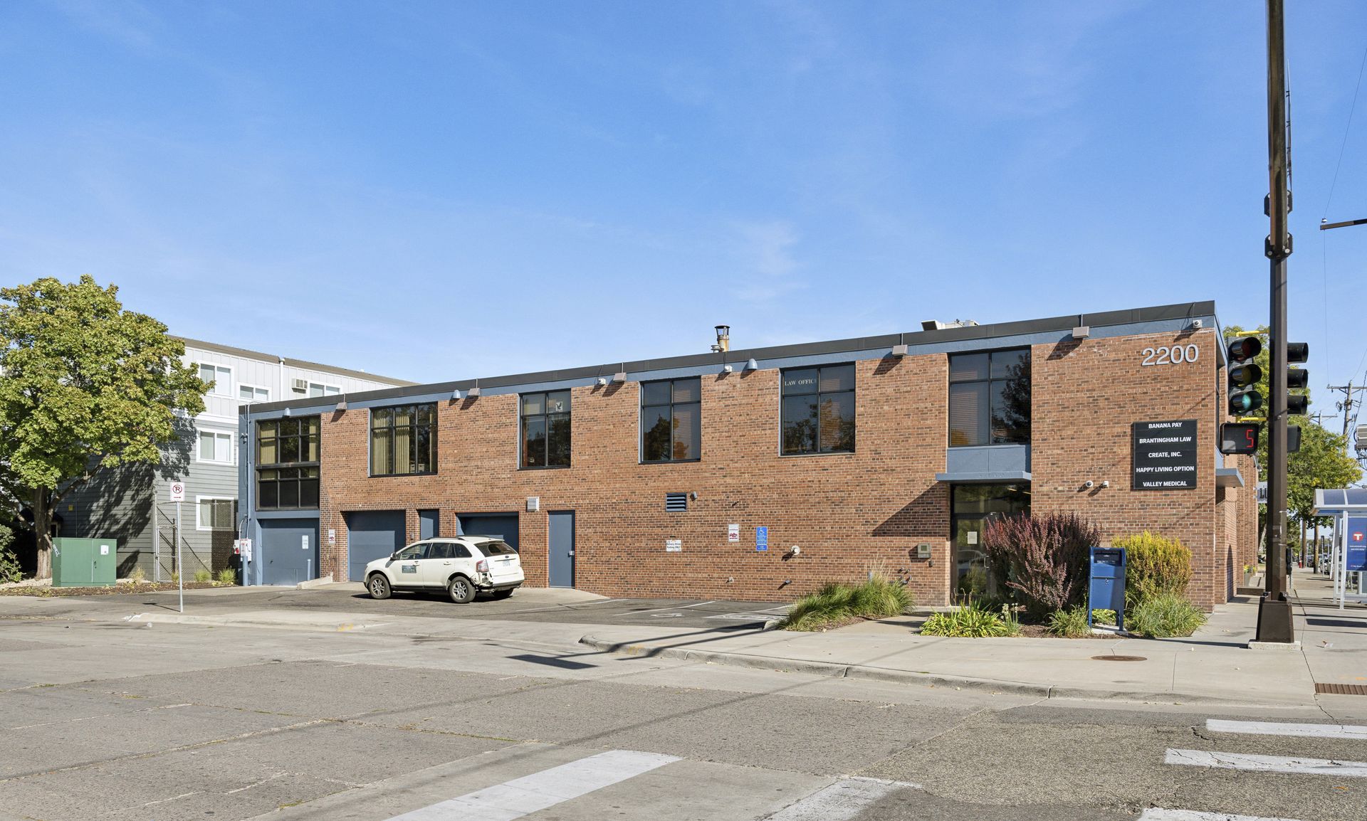 Rear elevation and on-site parking at the Seward Building