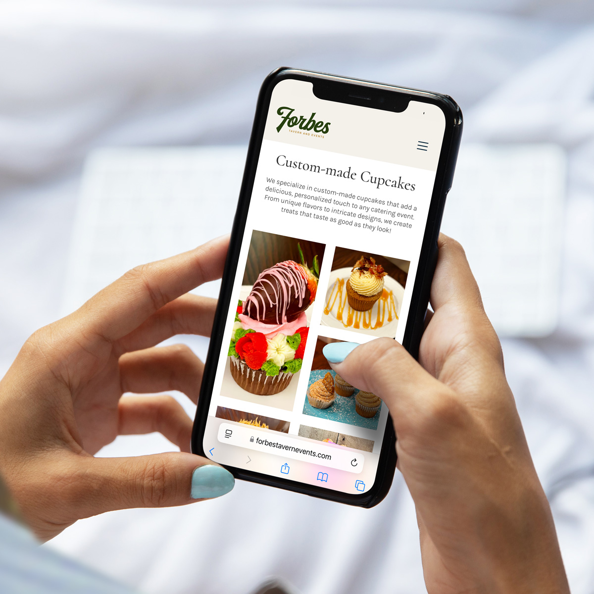 Forbes Tavern custom cupcakes page on a smartphone