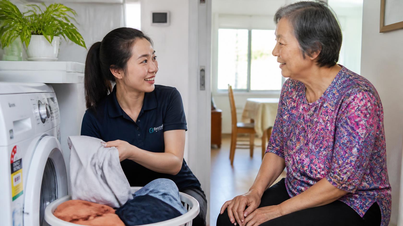Support worker helping with laundry as part of Everyday Living supports