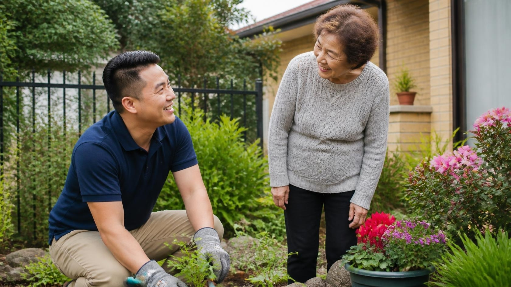 Support worker helping a client with gardening and lawn care