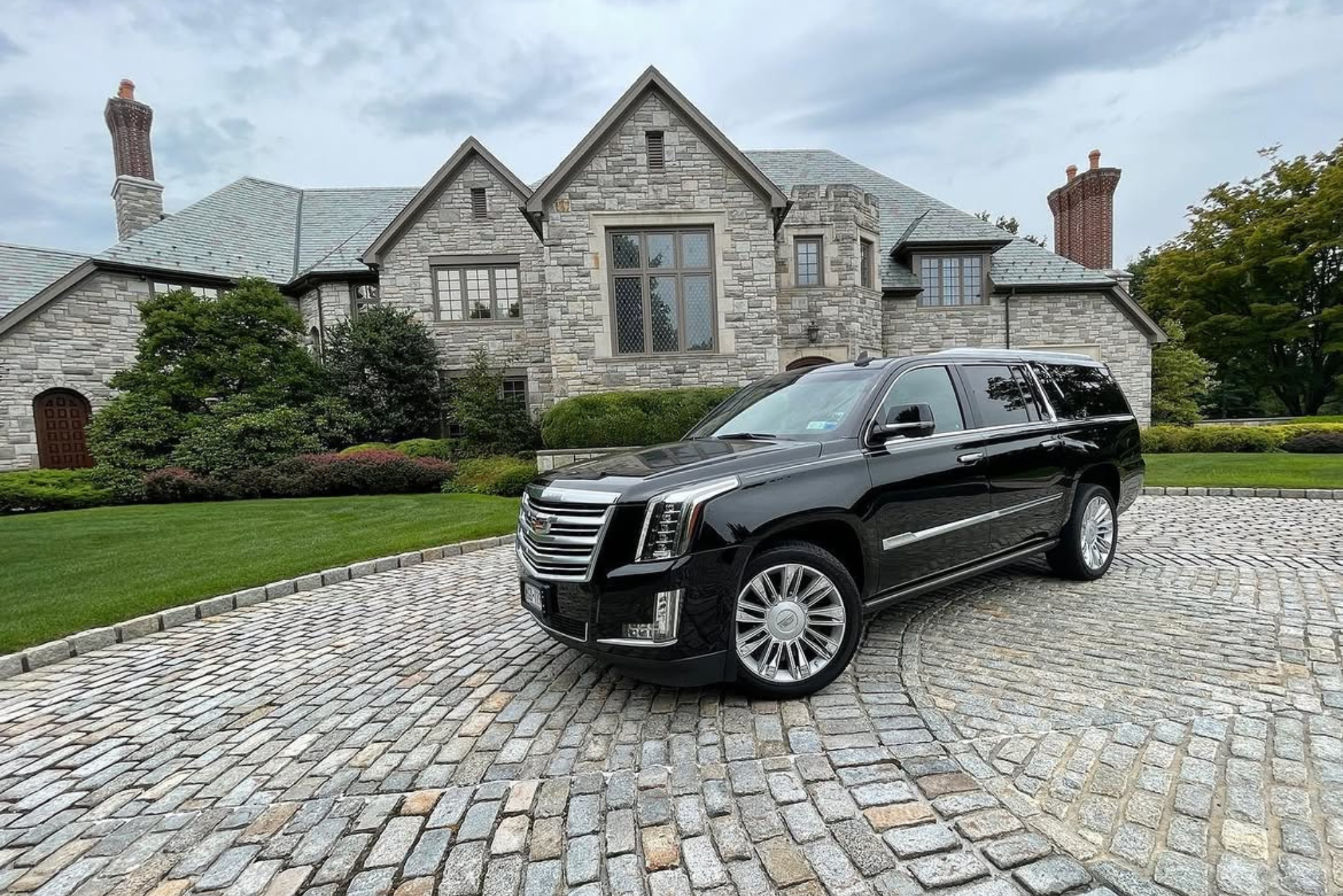 escalade pulling up to a high profile client