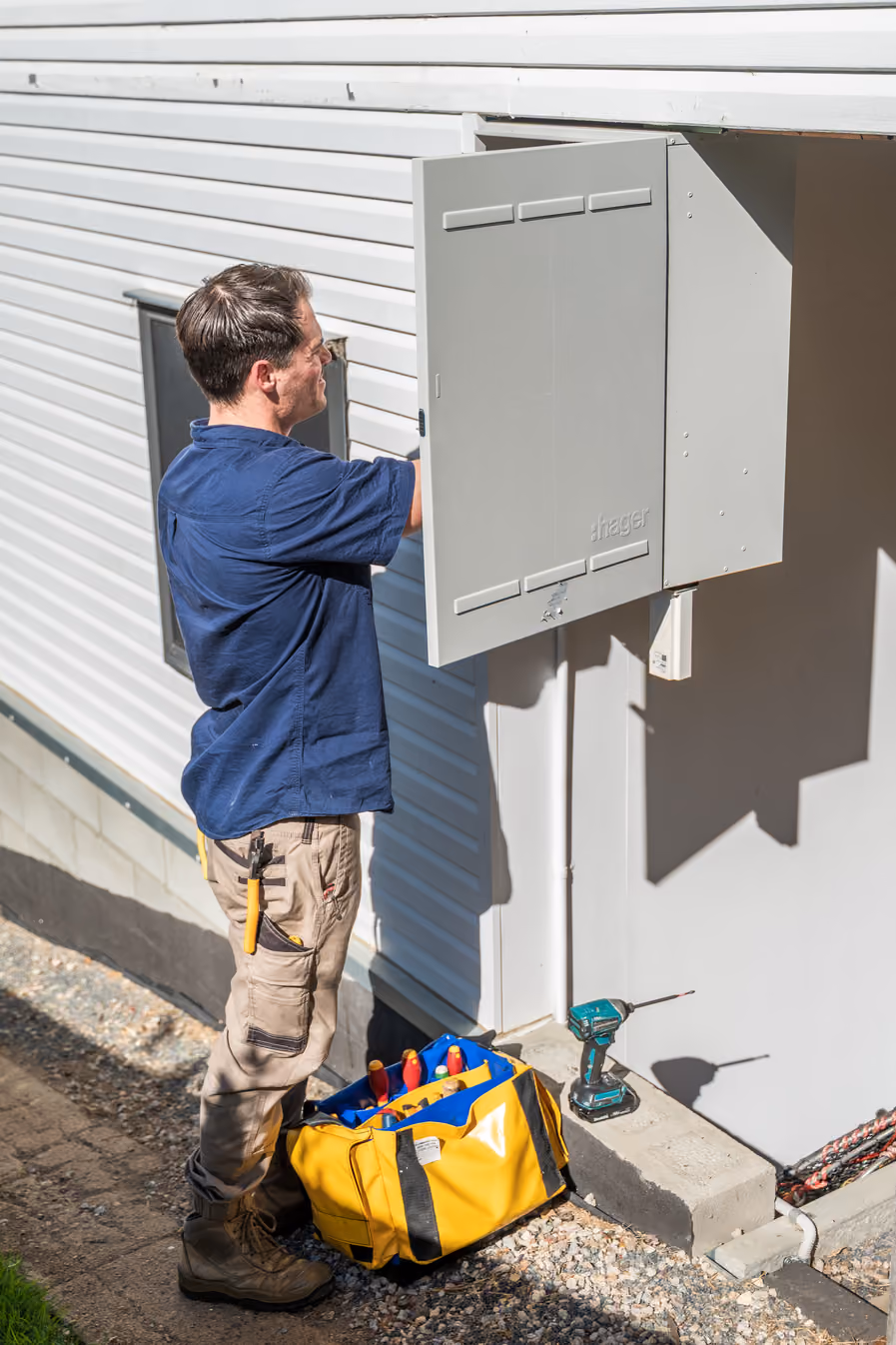 Professional electrician providing electrical services