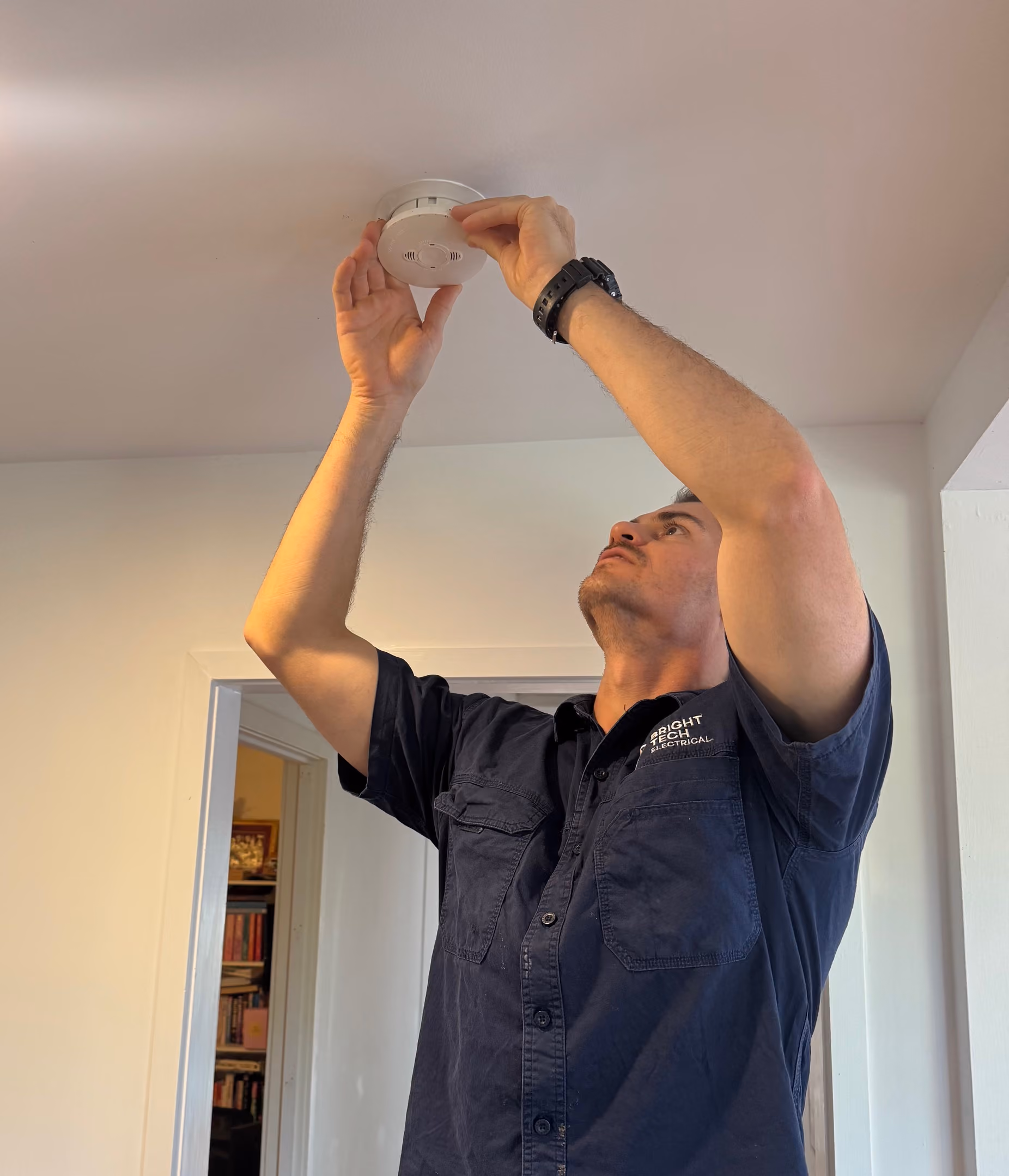 Electrician installing lighting and ceiling fans in Brisbane