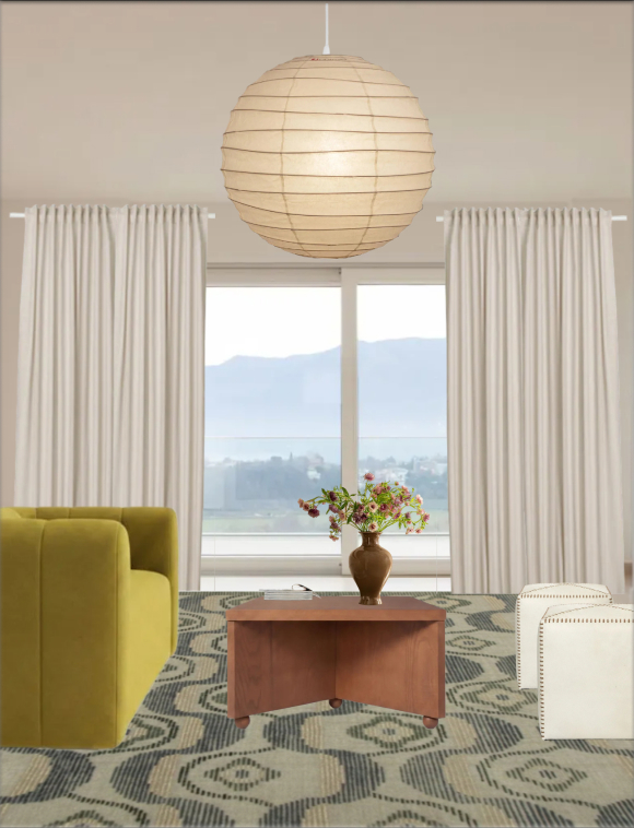 Freeform room design with an arched window, olive armchair, and patterned rug.
