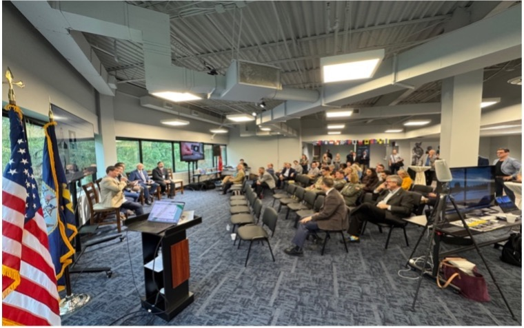 Audience gathered for a presentation at Neptune SHIELD Tech Hub