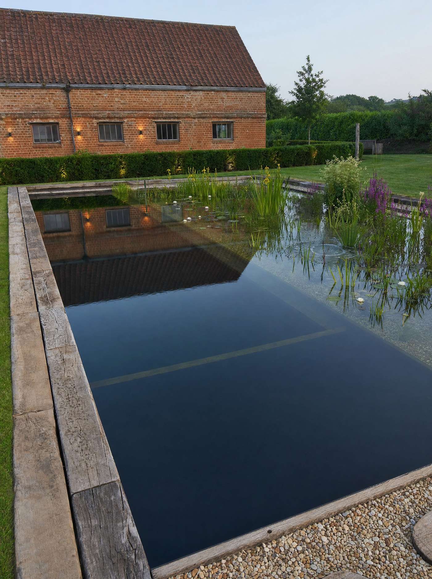 Swimming pond and oak jetty at first light