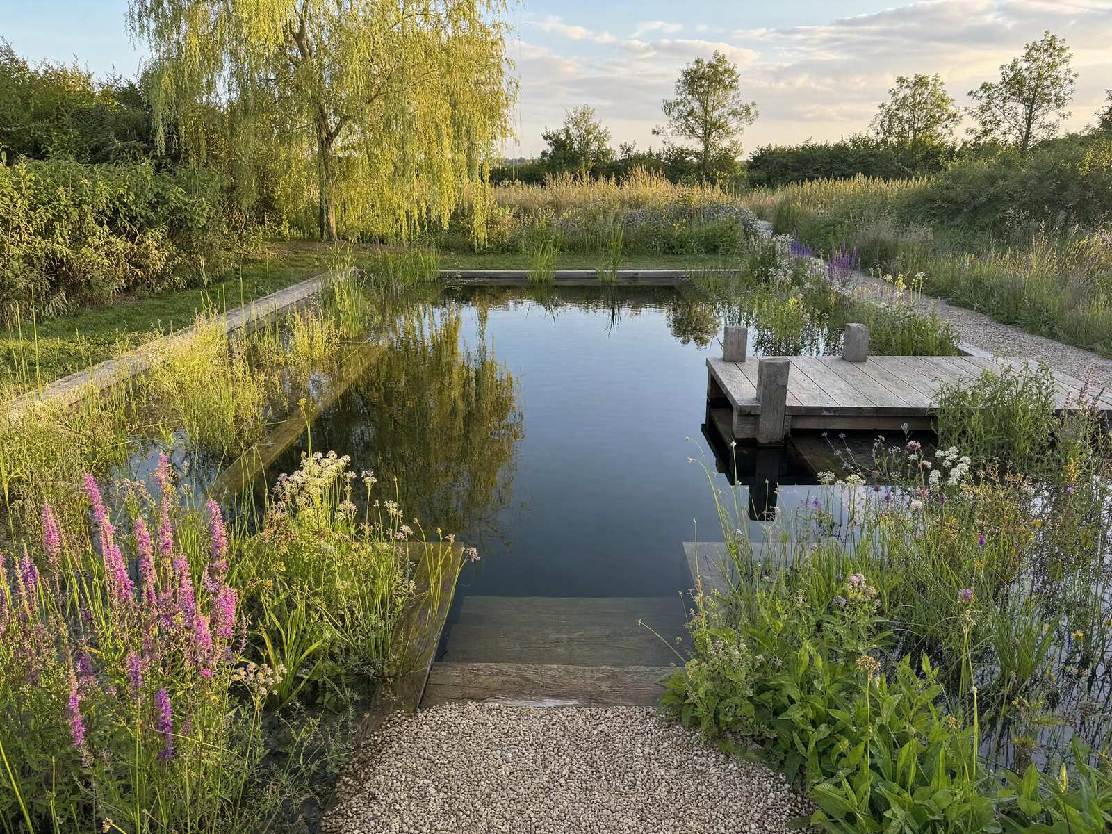 Formal swimming pool edged with stone coping
