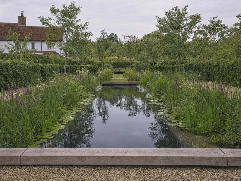 A natural bathing pool beside a timber lodge