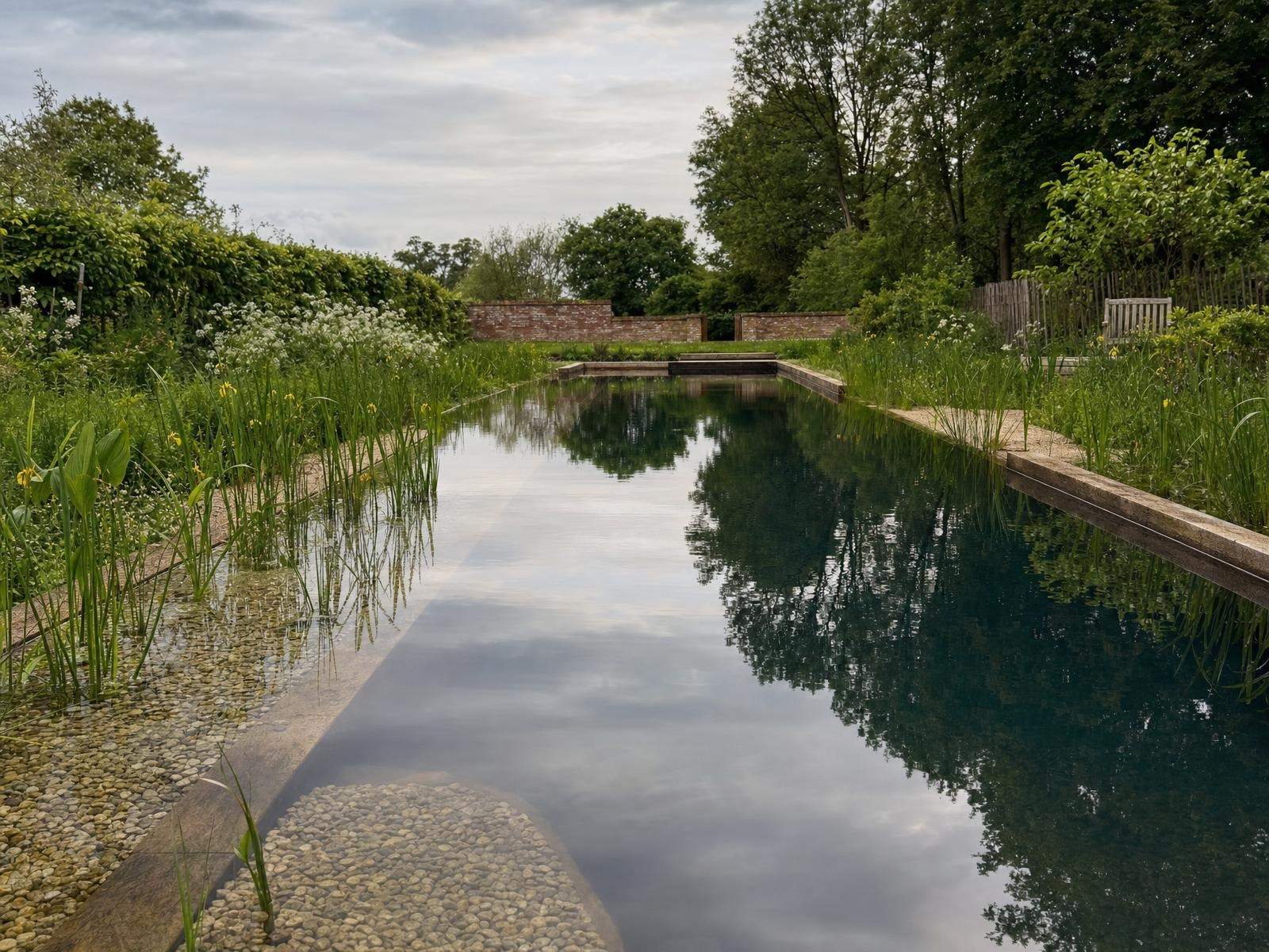 The submerged oak beam dividing the swim zone from the planted regeneration zone