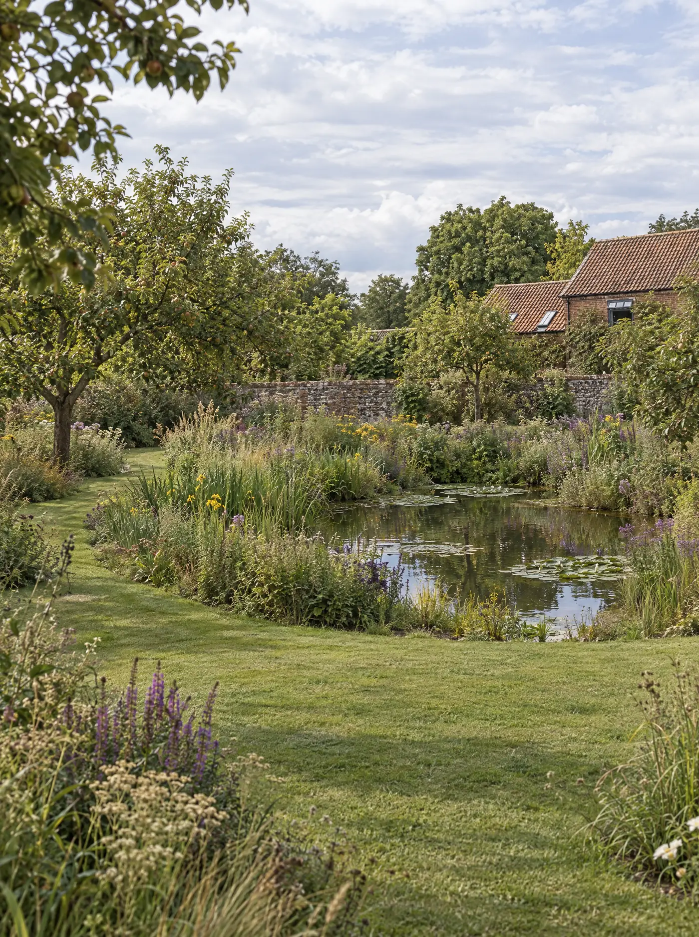 Wildlife pond design inspiration with natural margins and aquatic planting