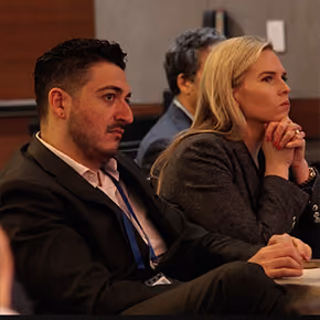 Plastic Surgeons sitting during a live lecture on body contouring