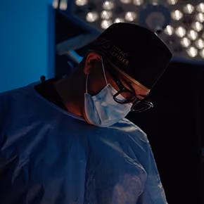 Dr. Hoyos performing surgery in the operating room