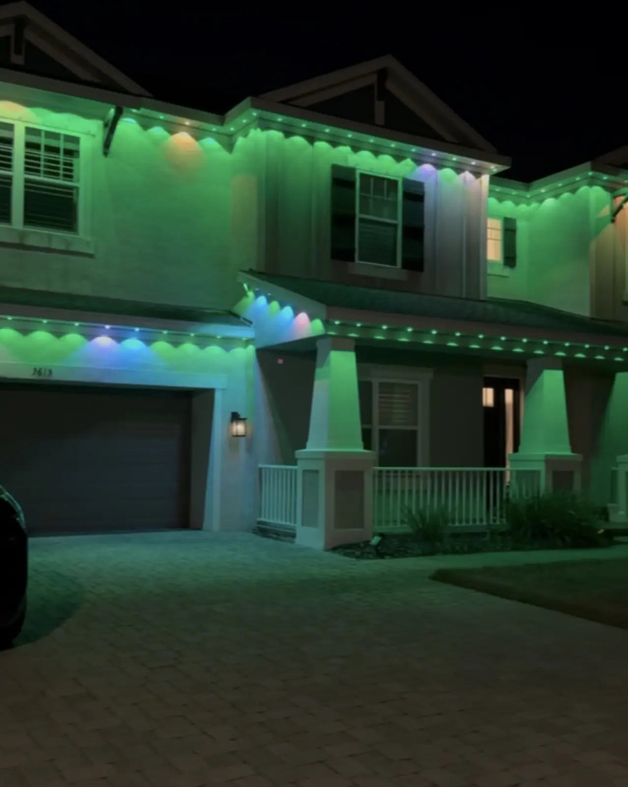 Home displaying permanent color-changing exterior lights