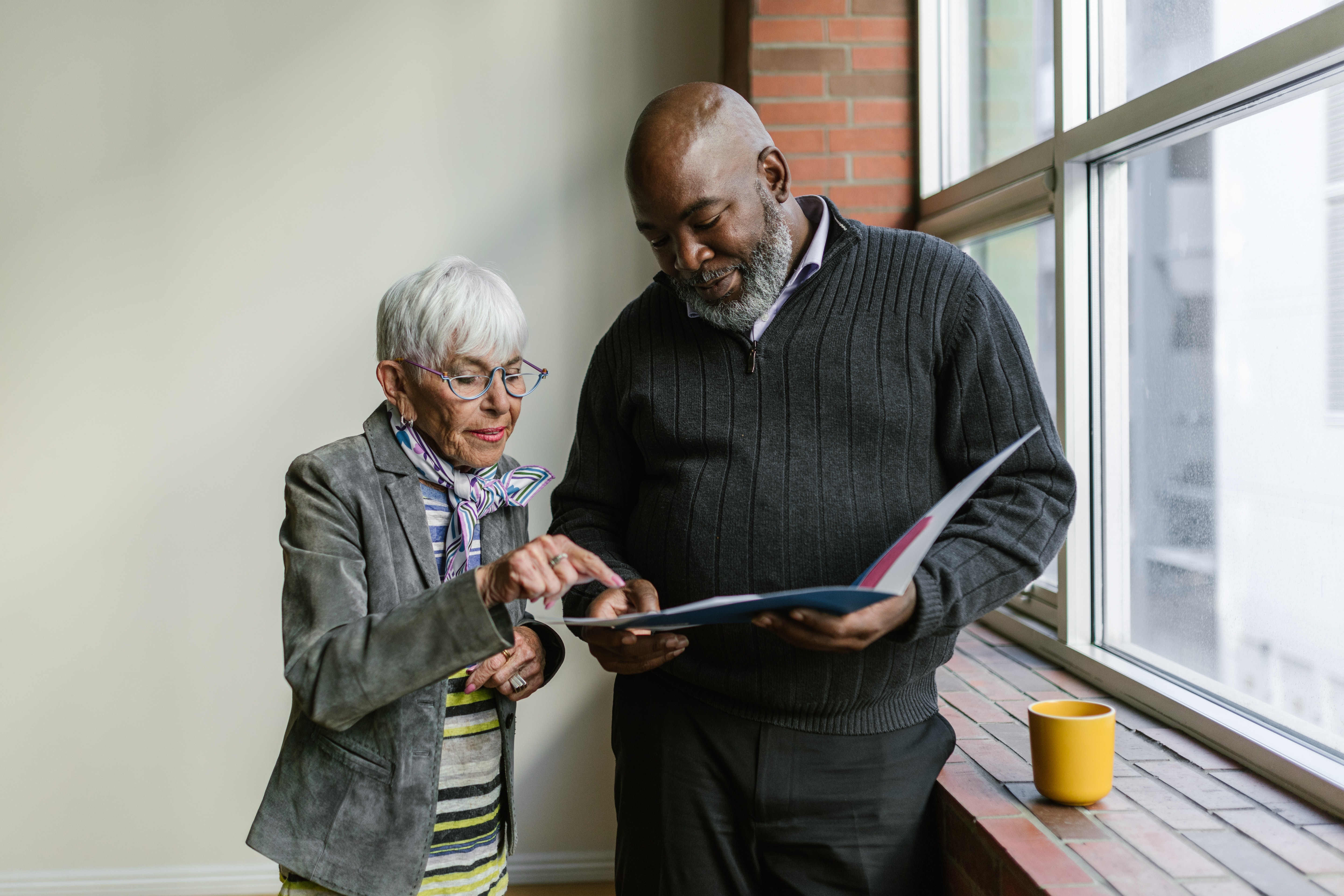 looking at a brochure stock image