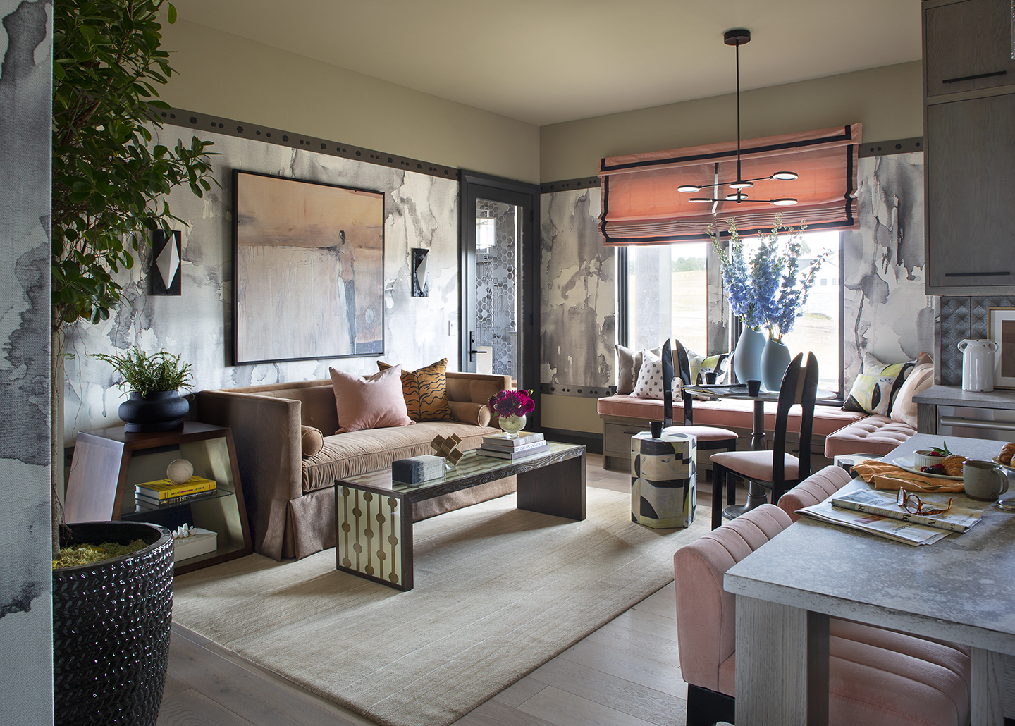 Boomer Suite hearth room with sofa, dining table and wallpapered walls