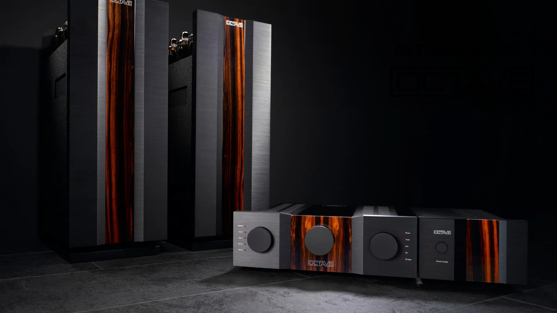 Octave Jubilee preamplifier and Jubilee Mono amplifiers in black with wood inlays