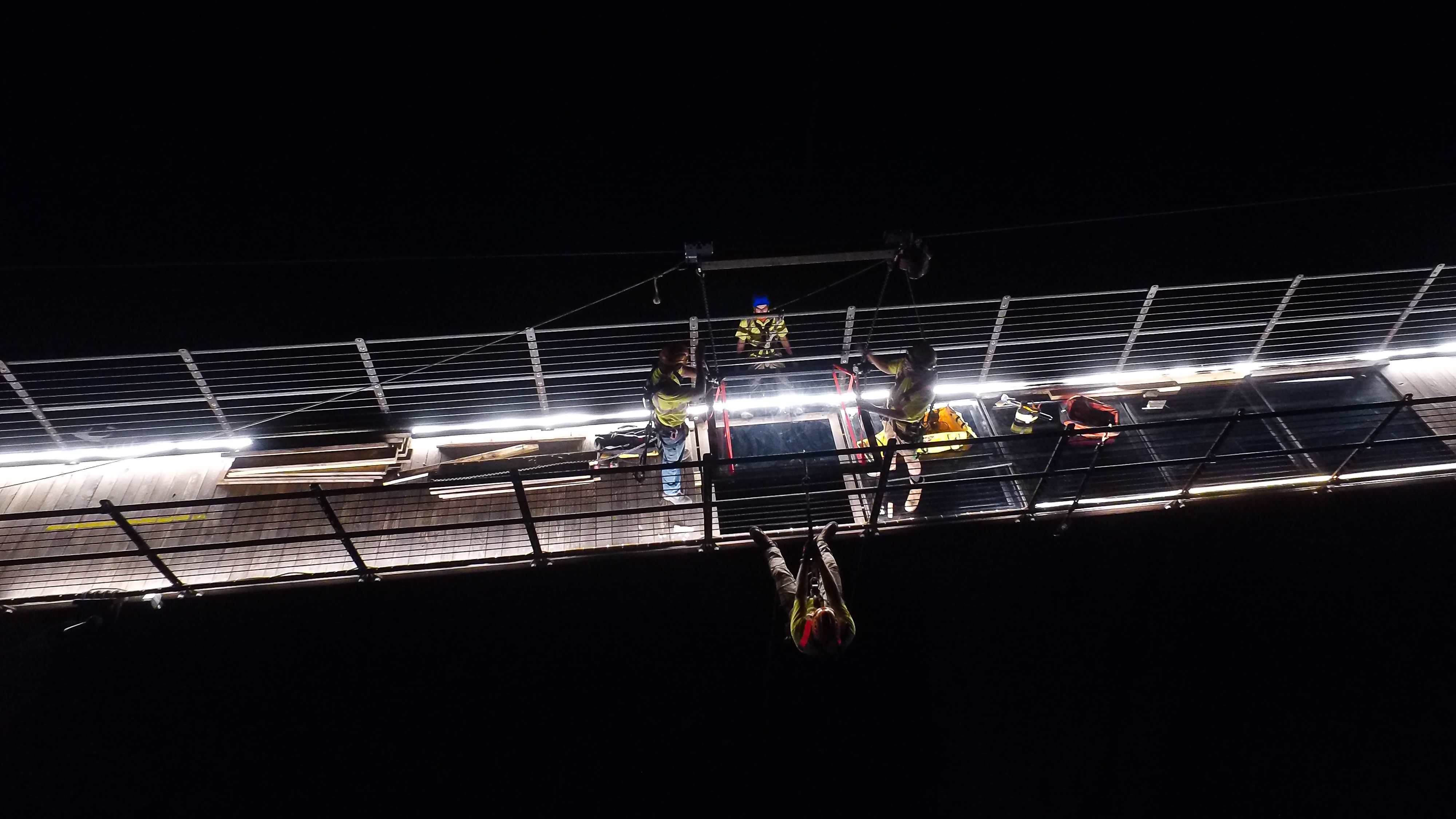 Gatlinburg SkyBridge glass panel installation by ERi Experiential Resources