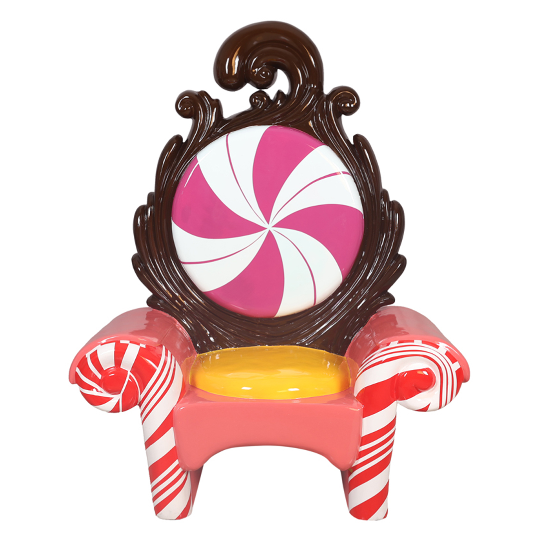 Colorful chair designed like candy with red-striped candy cane arms, yellow candy seat, and a pink-and-white swirled candy backrest.