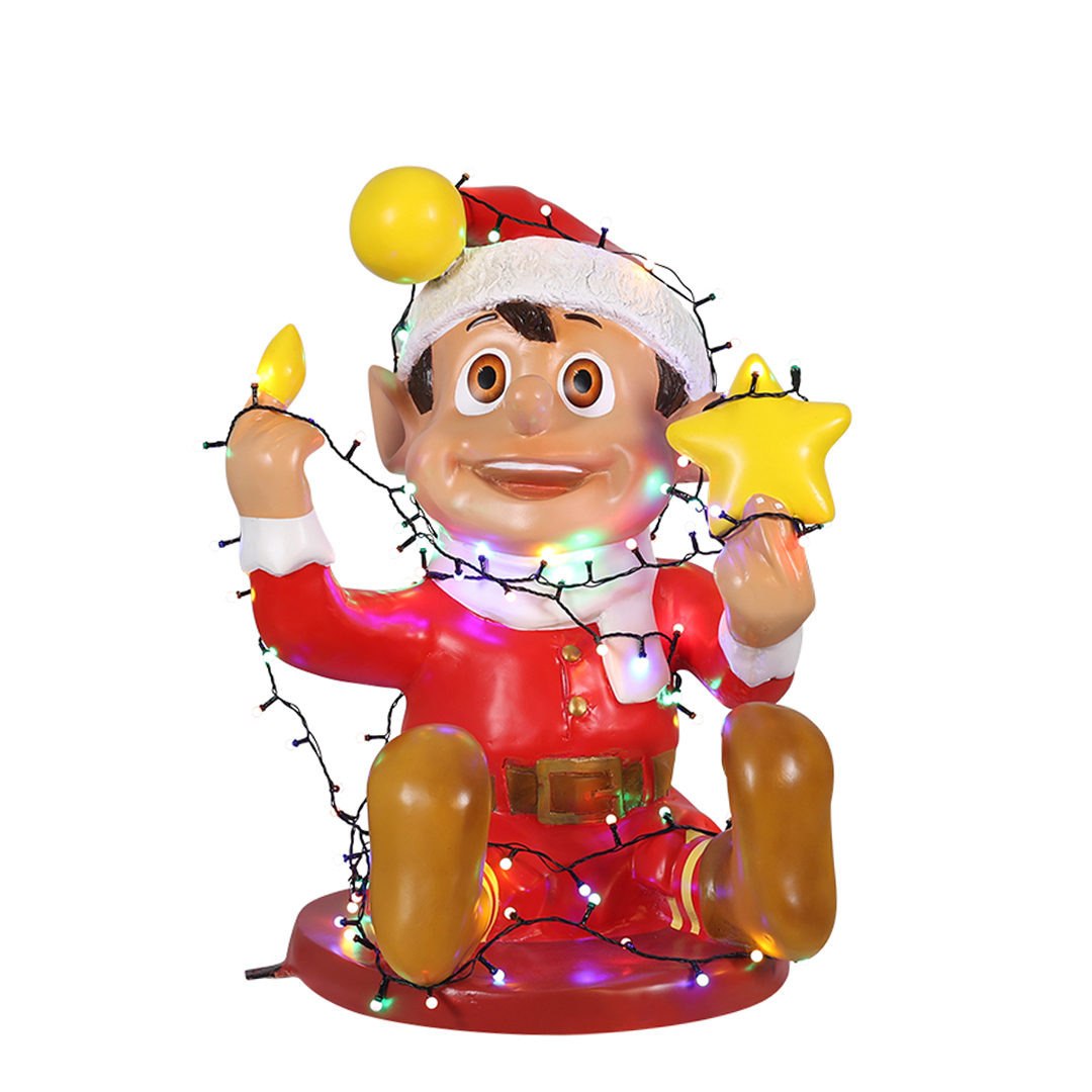 Smiling Christmas elf figure in red outfit wrapped in colorful string lights holding a yellow star.