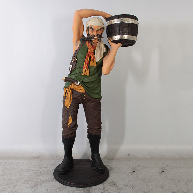 pirate figure holding bucket with knife in his mouth