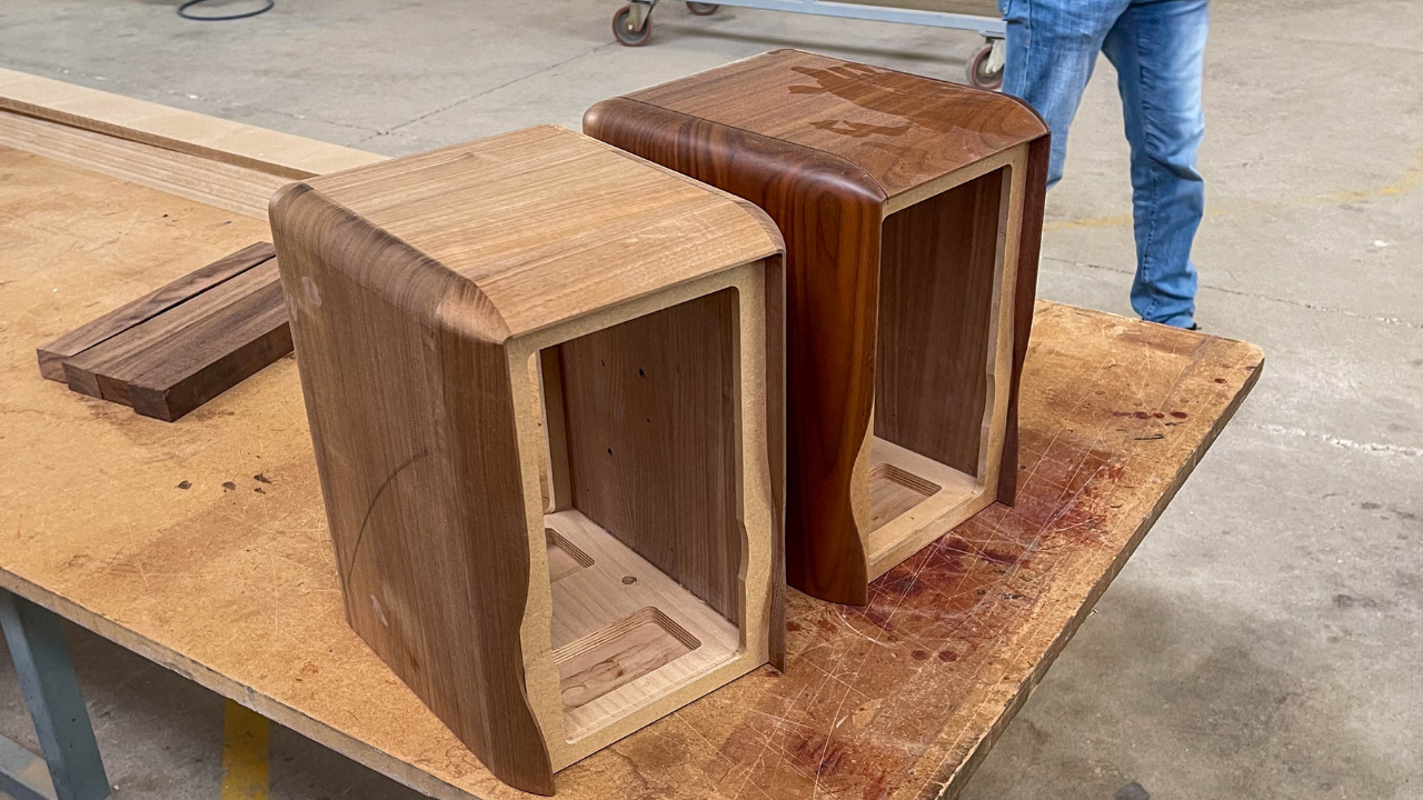 Sonus faber artisans shaping a loudspeaker cabinet in Vicenza