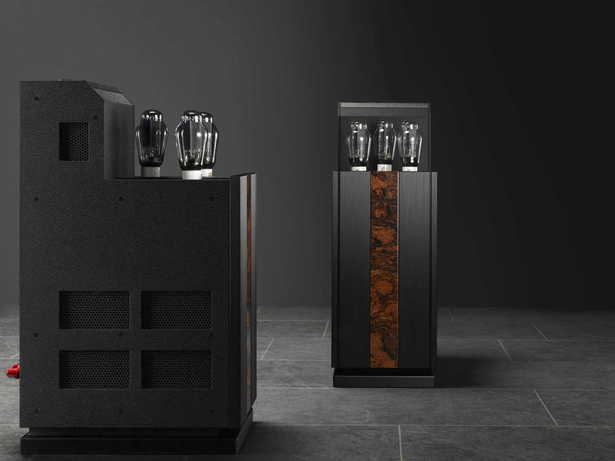 Octave Jubilee 300B single-ended monoblock amplifiers, pair on a dark studio floor