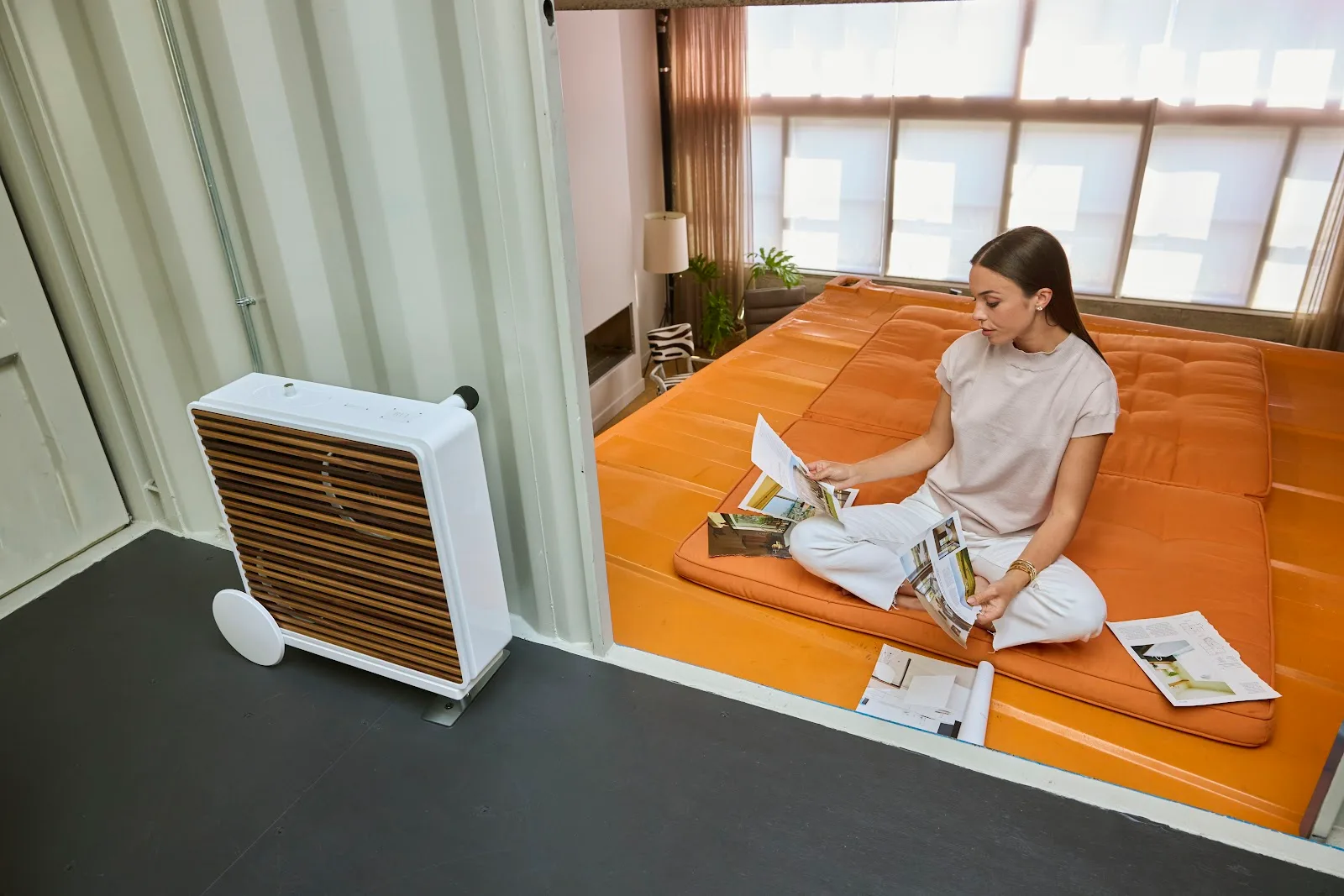 REL Planar PL-1 wall-mounted in a loft interior with the premium wood grille