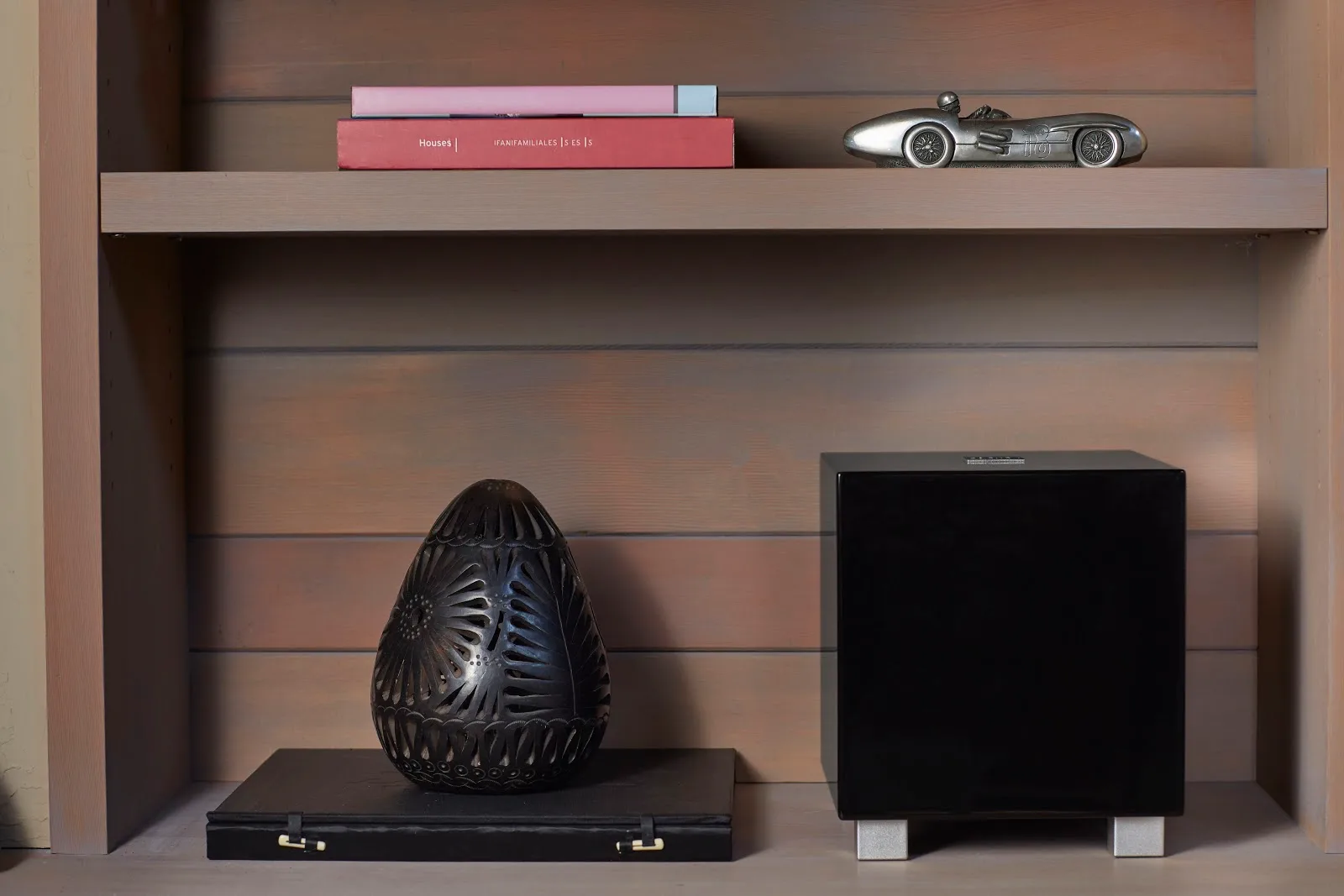 REL Tzero MKIII placed on a shelf in a compact second system