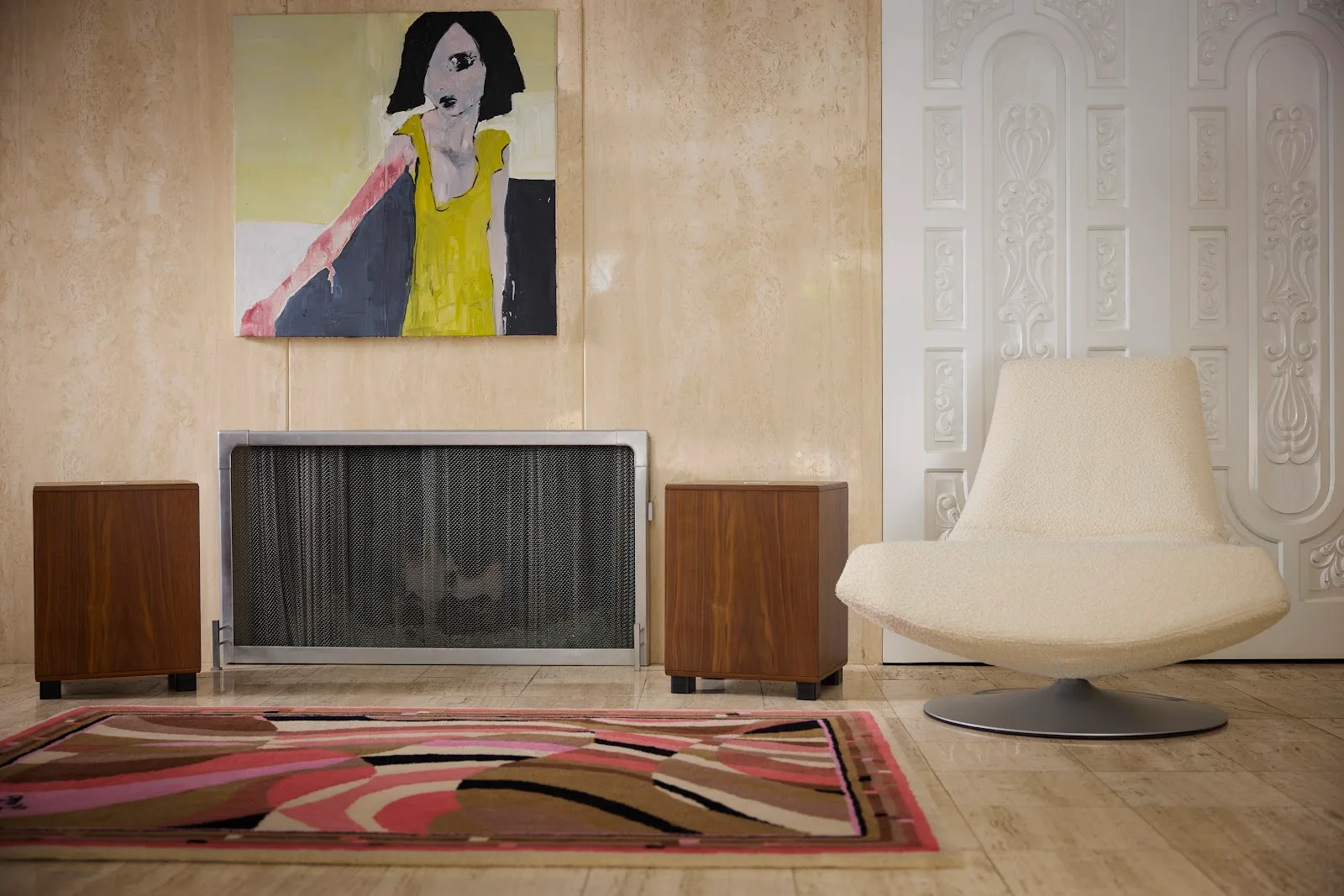 REL Classic 99 subwoofer beside a fireplace in a vintage-styled listening room