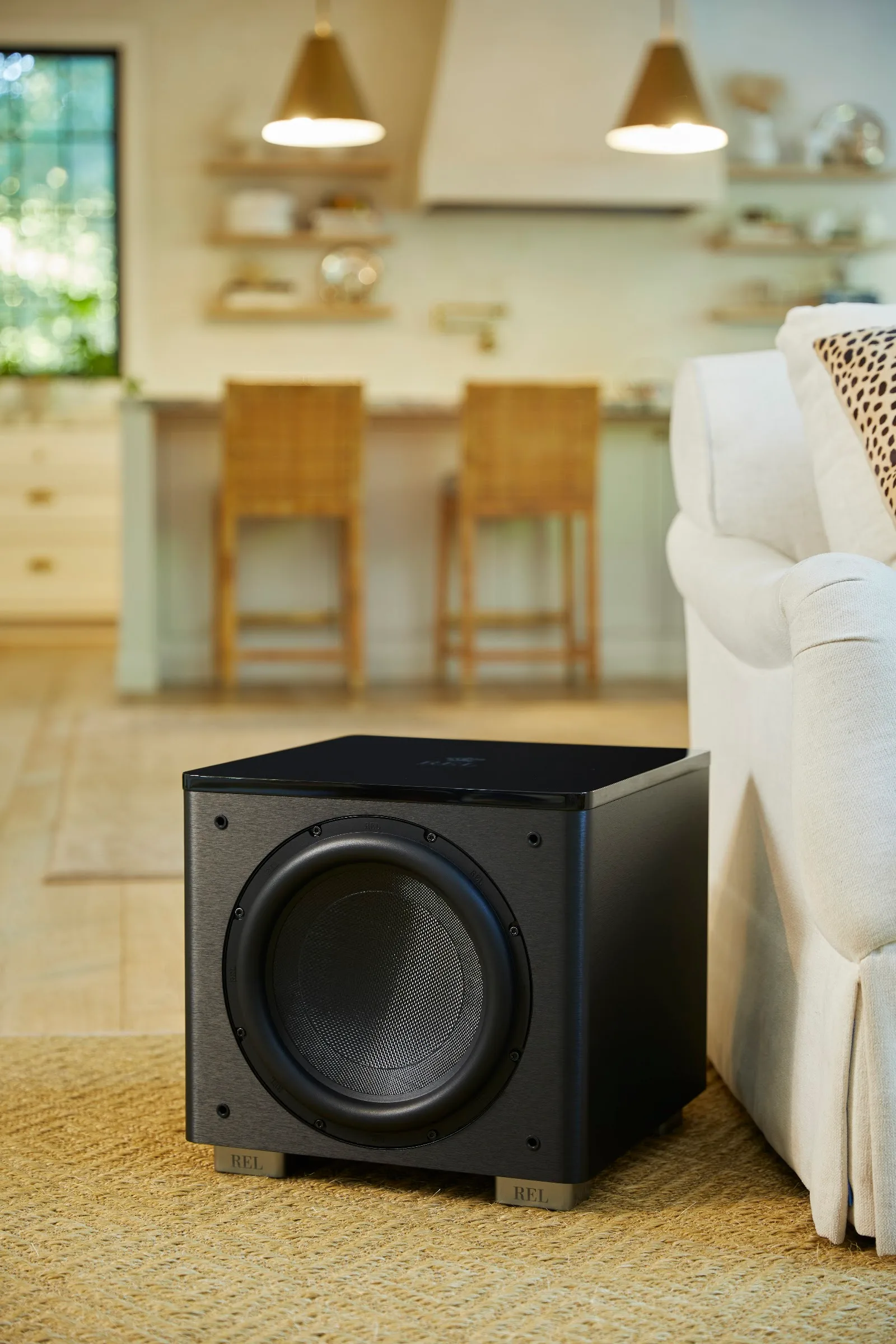 REL HT/1205 MKII subwoofer in a living room home theatre installation