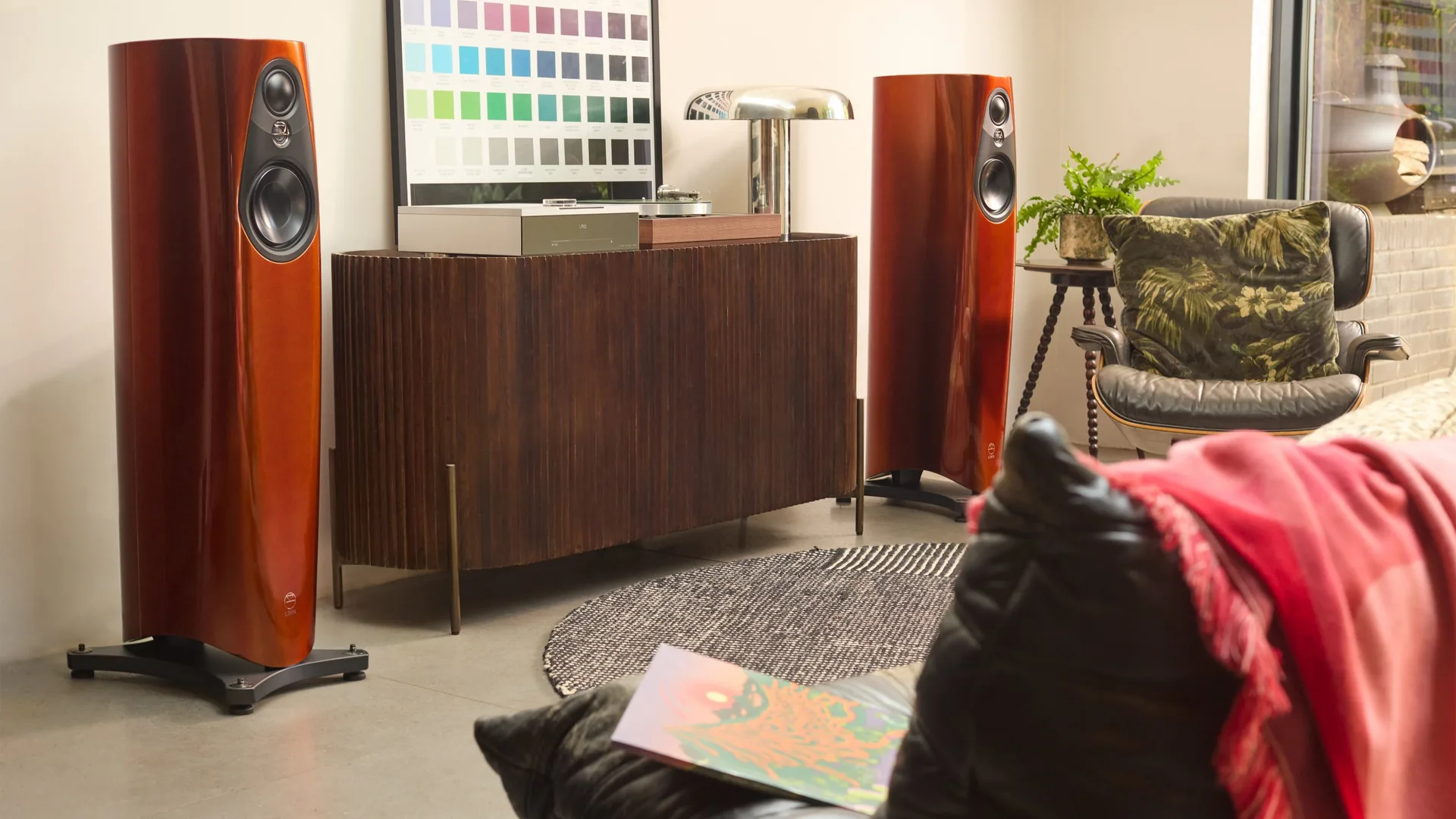 Linn 343 loudspeakers in Single Malt finish in a living room with a Linn system