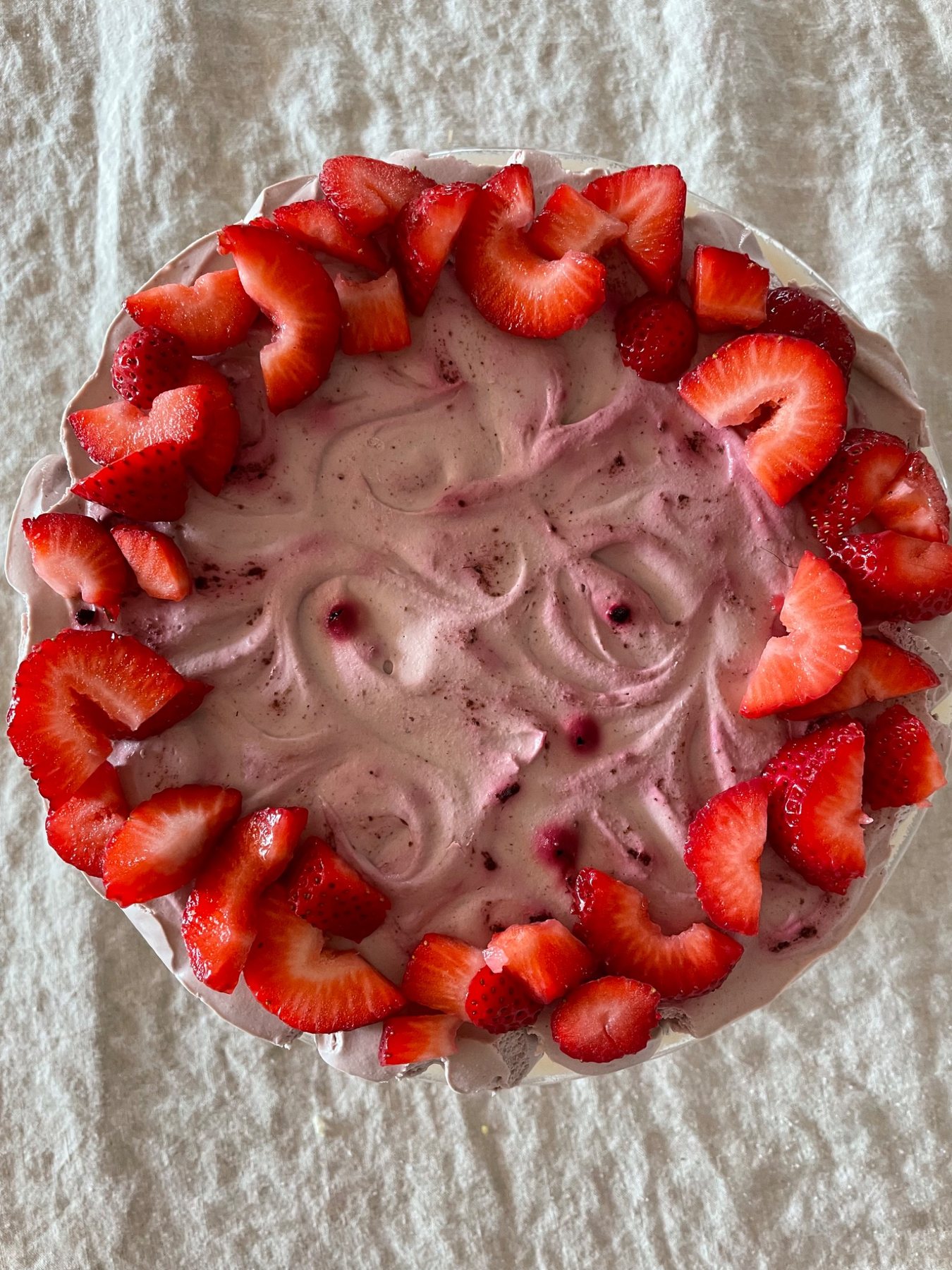 A strawberry cake prepared with fresh fruit