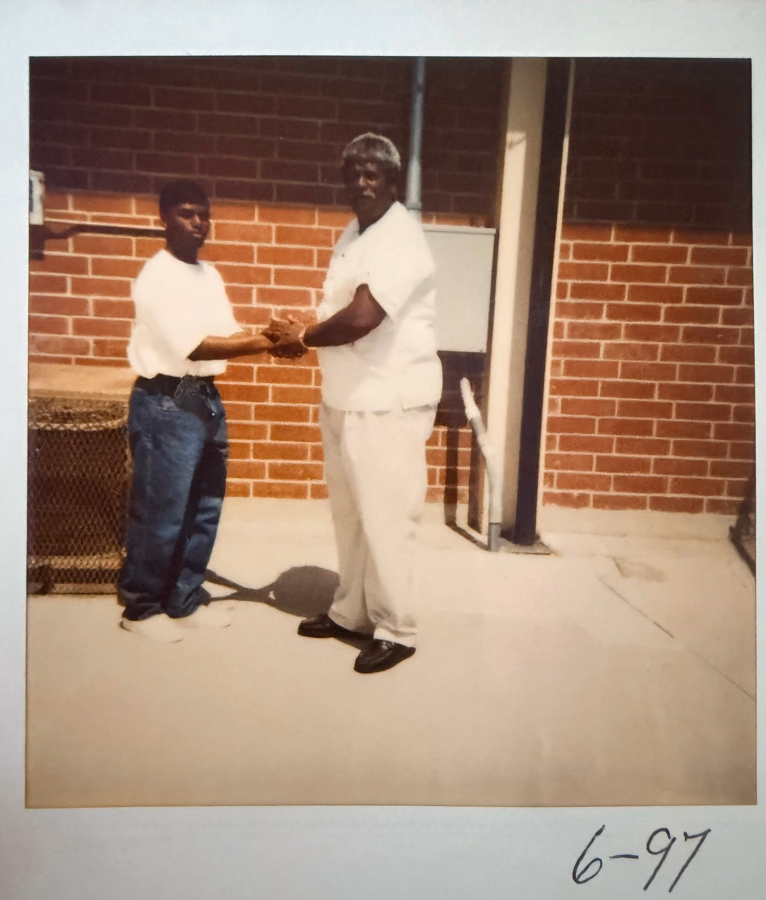 A photo of Lawrence R. Mike and his family