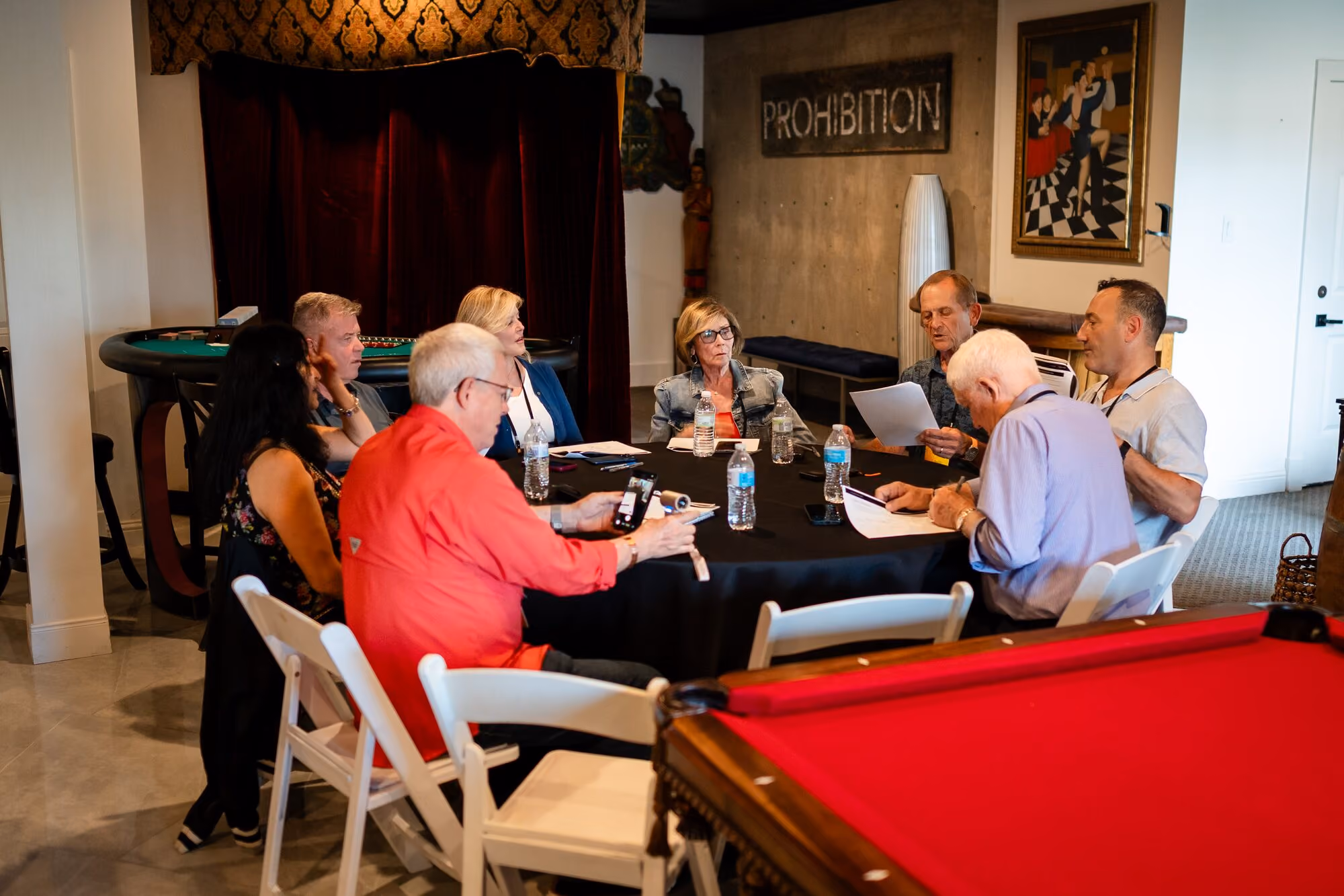 A small group working through a question around one table