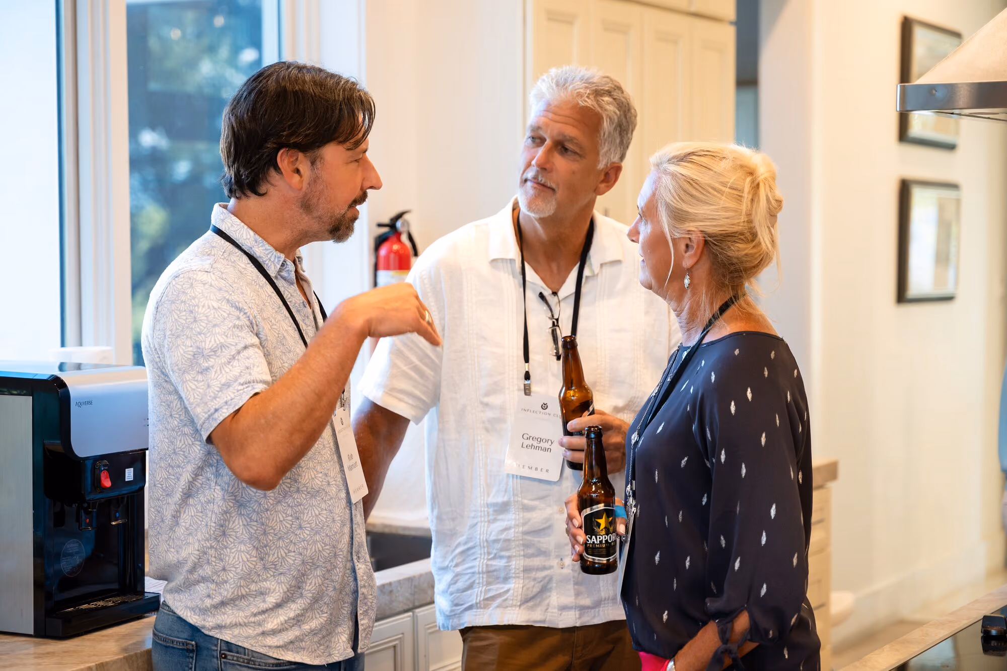 Two members talking at an Inflection Club event