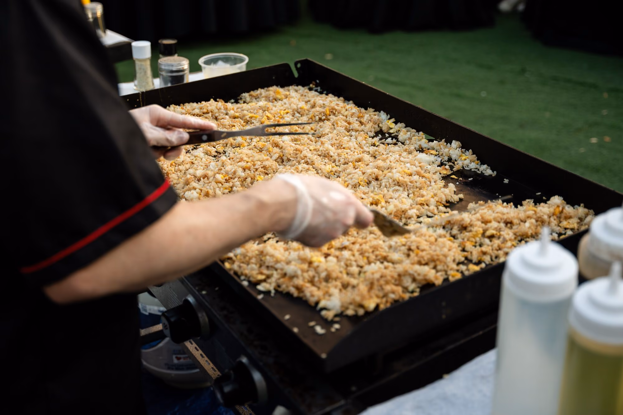 Food being cooked on the griddle at the members dinner