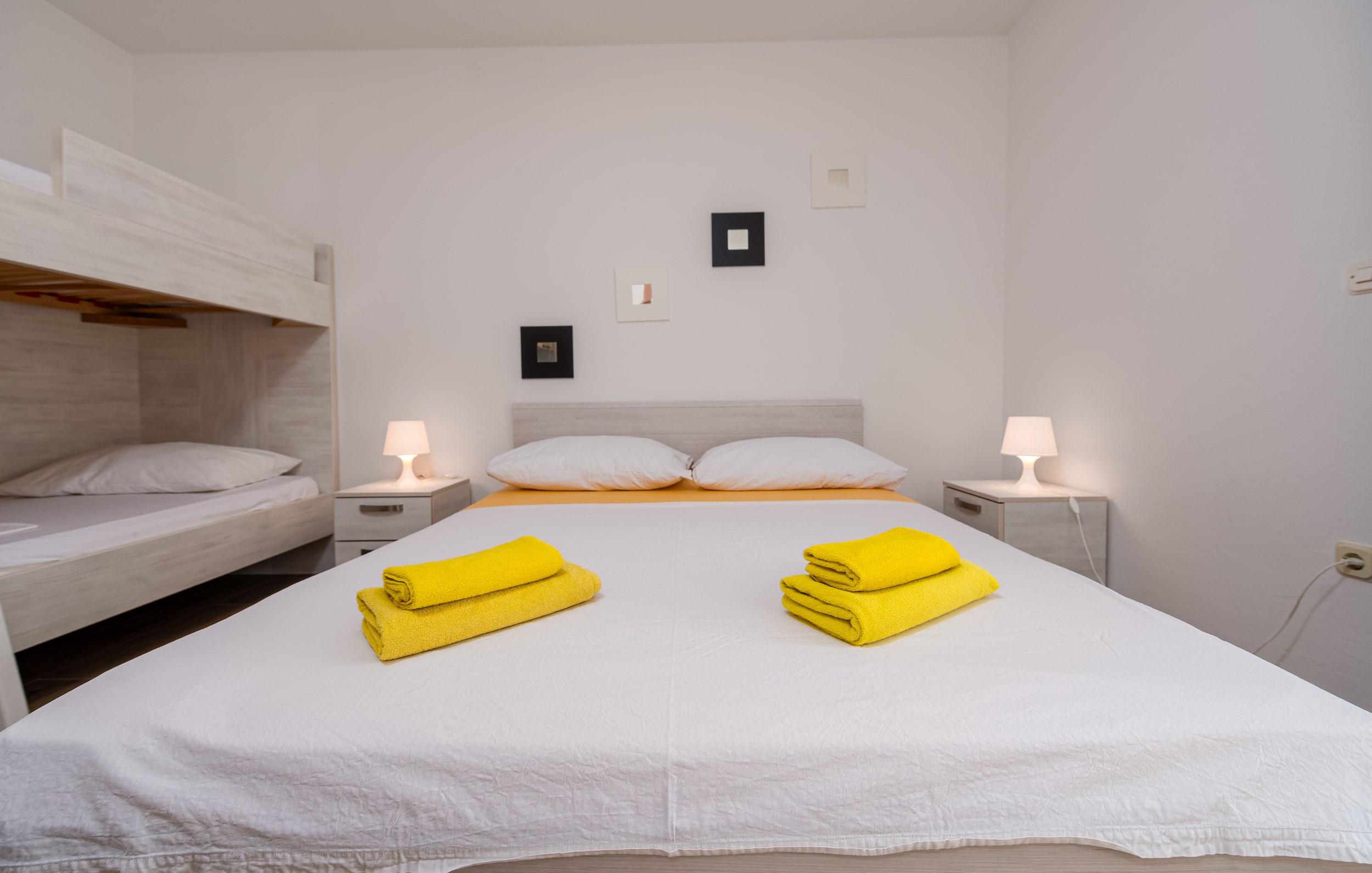 Double bed with bunk beds alongside, Apartment Yellow