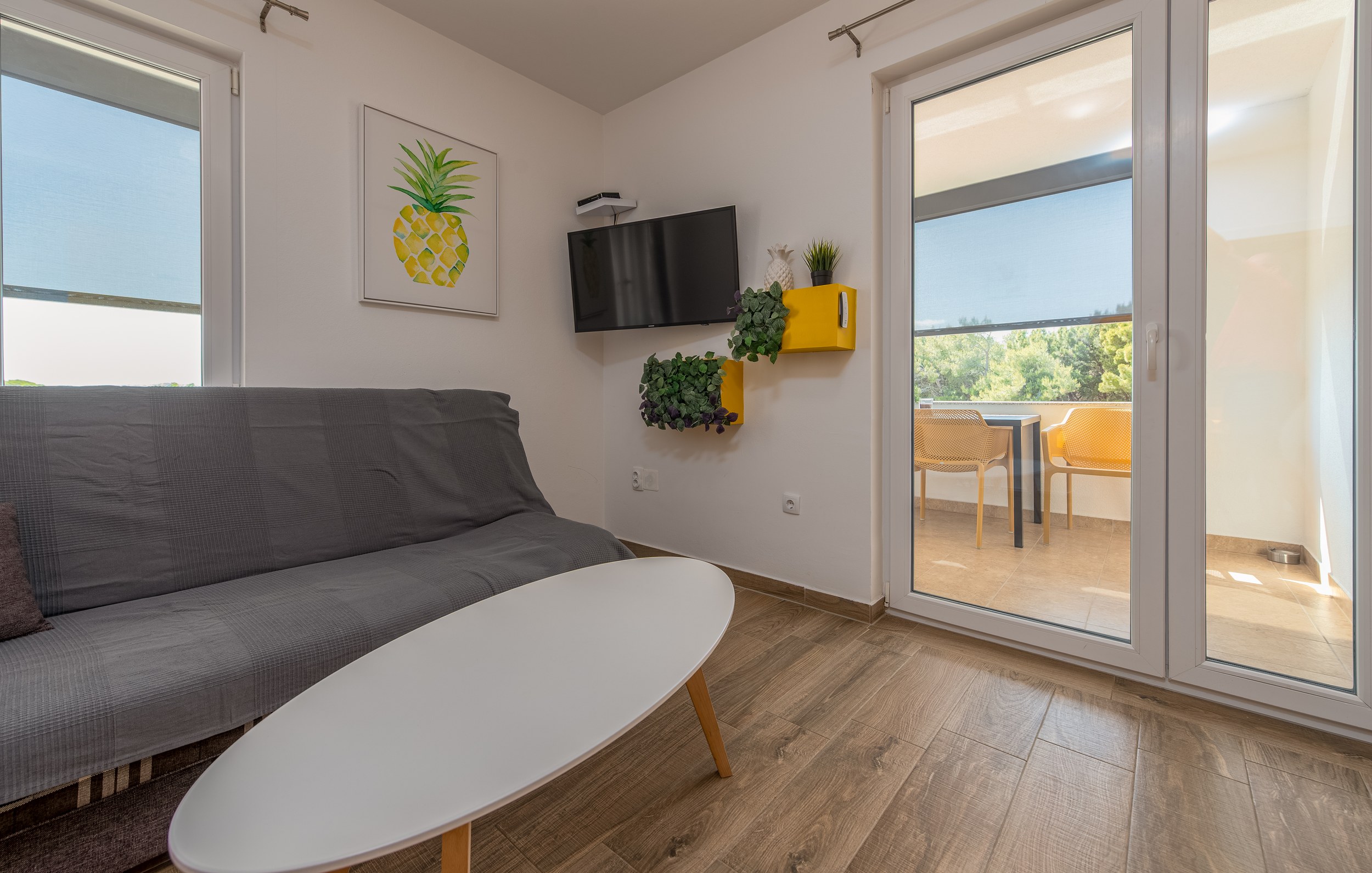 Living room opening onto the sea-view terrace, Apartment Yellow