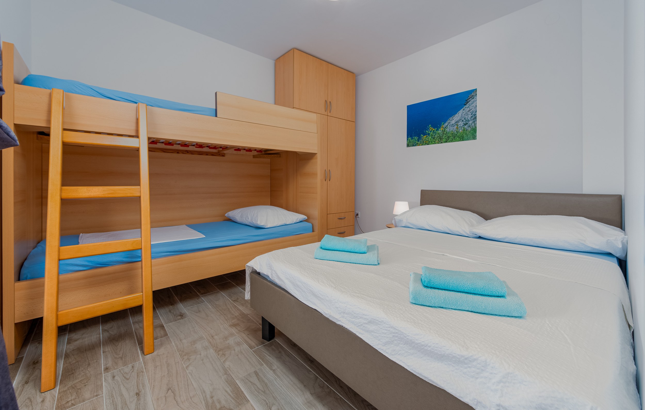 Bedroom with double bed and bunk beds, Apartment Blue